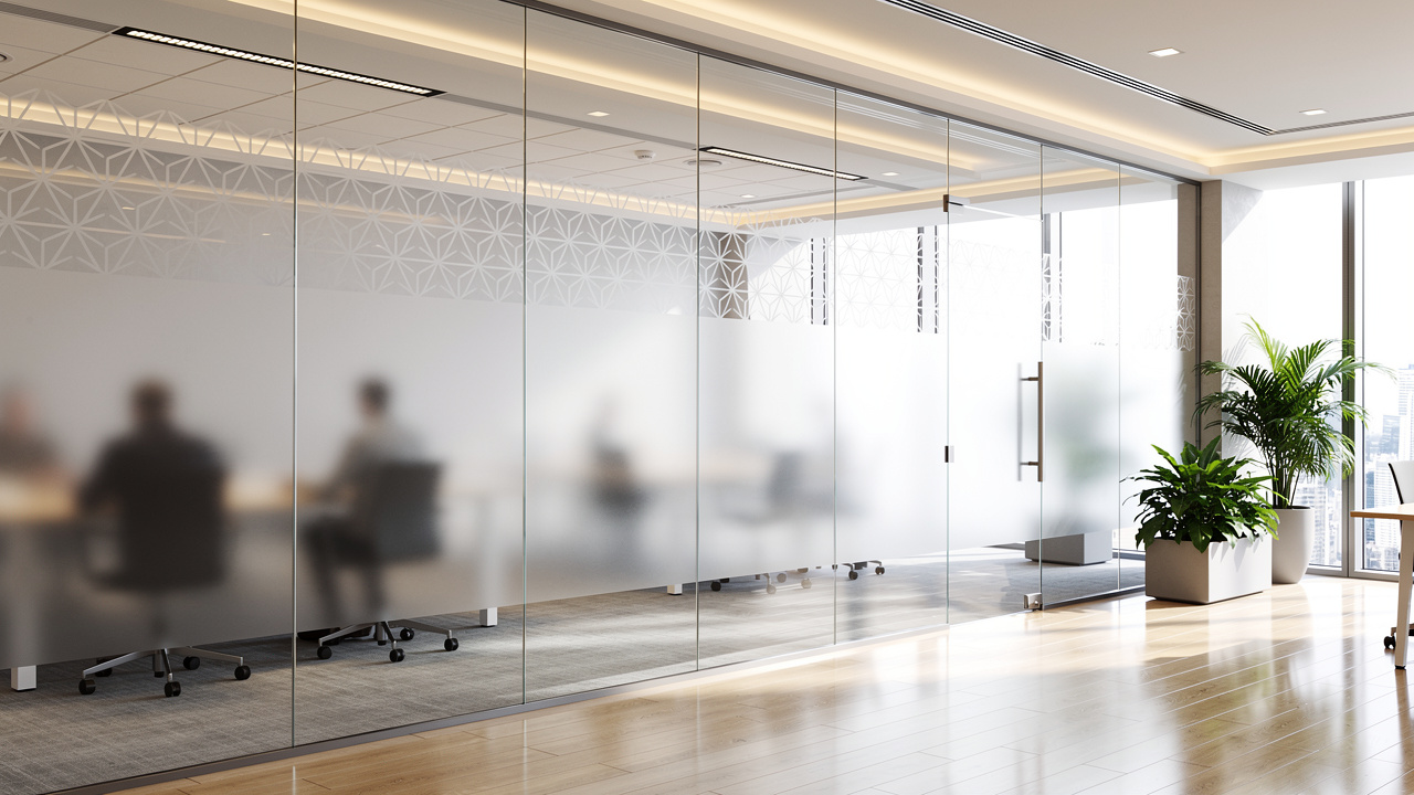 Printed glass partitions with privacy bands in a modern office