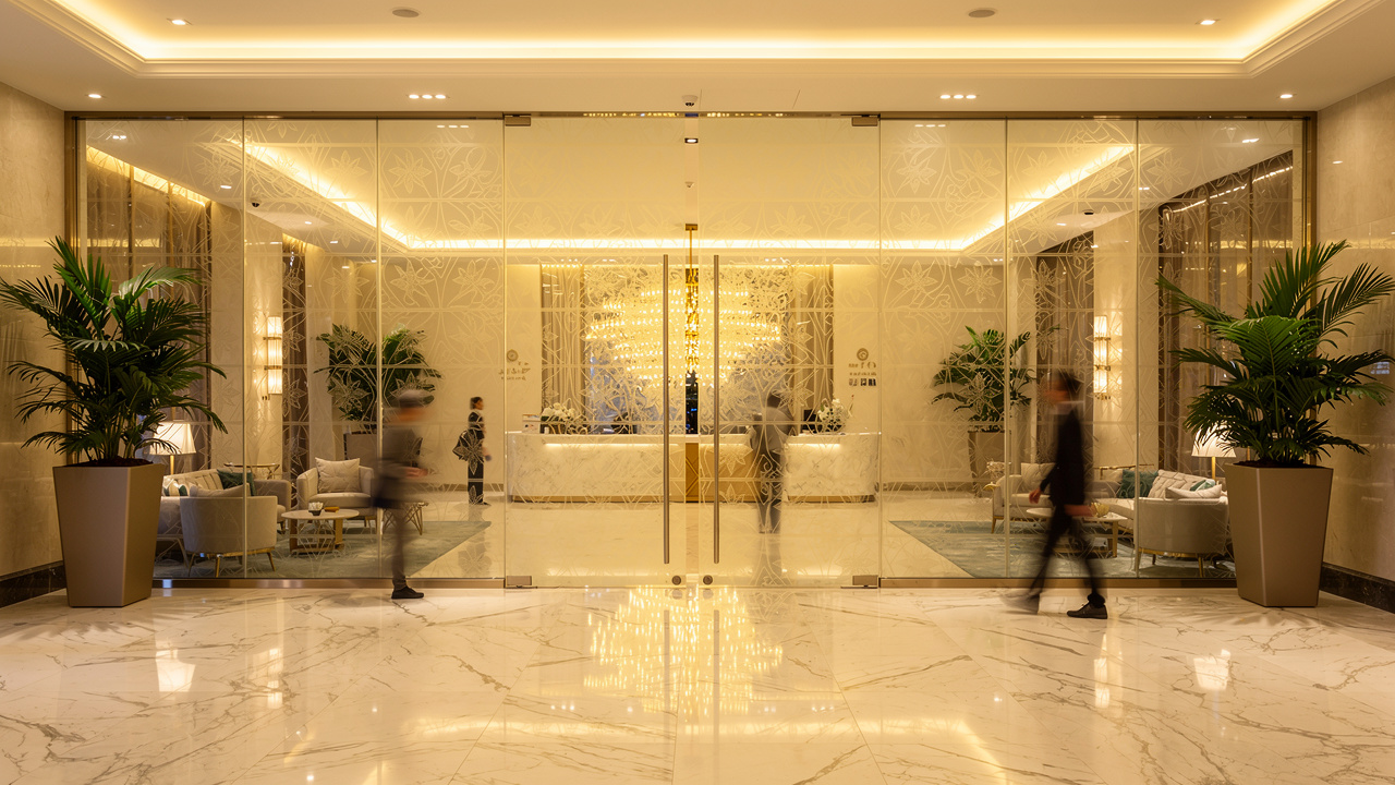 Elegant hotel lobby with UV-printed frosted glass partitions
